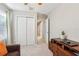 Bedroom with double doors leading to hallway at 7069 Towne Lake Rd, Riverview, FL 33578