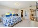 King size bed with walk in closet and ensuite at 7069 Towne Lake Rd, Riverview, FL 33578