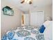 Spacious bedroom with mounted TV and ensuite access at 7069 Towne Lake Rd, Riverview, FL 33578