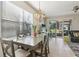 Bright dining area with table and chairs, view to backyard at 7069 Towne Lake Rd, Riverview, FL 33578