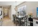 Dining area with gray table and chairs near the kitchen at 7069 Towne Lake Rd, Riverview, FL 33578