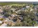 An aerial view of a neighborhood with a sports field and clear skies in the distance at 738 59Th Ne Ave, St Petersburg, FL 33703