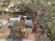 Charming single-story home on a verdant lot, as seen from an aerial perspective at 738 59Th Ne Ave, St Petersburg, FL 33703