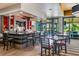 Modern clubhouse bar with indoor and outdoor seating at 8784 Ashworth Dr, Tampa, FL 33647