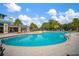 Large community pool with surrounding lounge area at 10641 Cardera Dr, Riverview, FL 33578