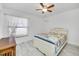 Bedroom featuring tile floors and natural lighting at 11045 Springridge Dr, Tampa, FL 33624