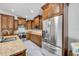 Spacious kitchen featuring stainless steel appliances and granite countertops at 11045 Springridge Dr, Tampa, FL 33624