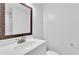This bathroom has a sink, mirror and toilet at 1137 King Arthur Ct # 510, Dunedin, FL 34698
