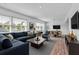 Open-concept living and dining area with modern furnishings and natural light at 1137 King Arthur Ct # 510, Dunedin, FL 34698