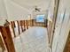 Renovation in progress: Kitchen with exposed framing and tile floor at 119 11Th Ave, Indian Rocks Beach, FL 33785