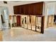 Picture of the exposed framing in the kitchen, under the upper cabinets, and the tile floors of a property for sale at 119 11Th Ave, Indian Rocks Beach, FL 33785
