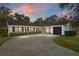 Charming ranch home with updated exterior, driveway, and landscaping at 13510 Shady Shores Dr, Tampa, FL 33613