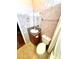 Bathroom has a vanity with granite countertop, toilet, and shower and tub combination at 145 Blue Marlin Dr, Oldsmar, FL 34677