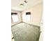 Bright bedroom with cozy carpet, offering a comfortable and inviting space to unwind at 145 Blue Marlin Dr, Oldsmar, FL 34677