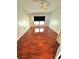 Spacious bedroom with ceiling fan and wood floors at 145 Blue Marlin Dr, Oldsmar, FL 34677