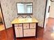 The kitchen has a peninsula island with storage and two chairs at 145 Blue Marlin Dr, Oldsmar, FL 34677