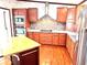 Updated kitchen with stainless steel appliances, wood floors, and plenty of cabinet space at 145 Blue Marlin Dr, Oldsmar, FL 34677
