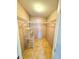 Spacious walk-in closet with wire shelving offers ample storage solutions for organized living at 145 Blue Marlin Dr, Oldsmar, FL 34677