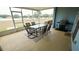 Screened patio with outdoor furniture and grill at 1552 Blue Magnolia Rd, Brandon, FL 33510