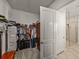 Large walk-in closet with ample shelving and hanging space at 16959 Scuba Crest St, Wimauma, FL 33598