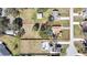 An aerial view displaying the spacious lot size with a pool and an outdoor building in the backyard at 17306 Lynndan Dr, Lutz, FL 33548