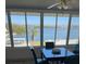 Bright dining area with water views and seating for four at 1819 Shore S Dr # 315, South Pasadena, FL 33707