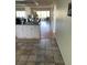 Open kitchen with breakfast bar and view to dining area at 1819 Shore S Dr # 315, South Pasadena, FL 33707