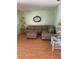 Living room featuring a comfortable sectional sofa and ottoman at 1819 Shore S Dr # 315, South Pasadena, FL 33707