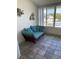 Sunroom with water views and comfortable seating at 1819 Shore S Dr # 315, South Pasadena, FL 33707