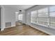 Spacious entryway with mirrored closet doors and large windows at 2351 Irish Ln # 21, Clearwater, FL 33763