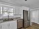 Kitchen with stainless steel appliances and granite countertops at 2351 Irish Ln # 21, Clearwater, FL 33763