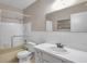 Bathroom with shower/tub combo, vanity with sink, and grab bars at 2402 Ecuadorian Way # 28, Clearwater, FL 33763