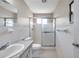 Clean bathroom with shower, toilet and granite vanity at 2402 Ecuadorian Way # 28, Clearwater, FL 33763