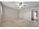 Bright bedroom with carpeted floor and ceiling fan at 2402 Ecuadorian Way # 28, Clearwater, FL 33763