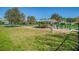Community dog park with covered seating and separate areas for small and large dogs at 2402 Ecuadorian Way # 28, Clearwater, FL 33763