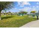 Relaxing picnic area with tables and grills at 2402 Ecuadorian Way # 28, Clearwater, FL 33763