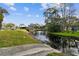 Small pond with a gazebo and grassy area perfect for relaxing at 2402 Ecuadorian Way # 28, Clearwater, FL 33763