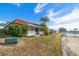 House exterior view with canal view at 272 Portree Dr, Dunedin, FL 34698