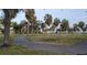 Paved trail winds through lush park landscape at 2724 20Th S St, St Petersburg, FL 33712