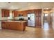Spacious kitchen featuring stainless steel appliances and wooden cabinets at 301 E Grace St, Punta Gorda, FL 33950