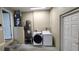 The laundry room features a modern washer and dryer for convenient chores at 301 E Grace St, Punta Gorda, FL 33950