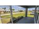 View from screened in porch of a nice yard and neighborhood street at 301 E Grace St, Punta Gorda, FL 33950
