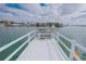 White wooden deck overlooking the calm water at 31 Island Way # 703, Clearwater, FL 33767