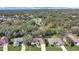 Aerial view of homes nestled in a wooded area at 3307 Kilmer Pl, Plant City, FL 33566