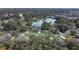 Aerial view of lakefront home in a community at 3307 Kilmer Pl, Plant City, FL 33566