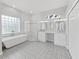 Elegant bathroom with double vanity, soaking tub, and walk-in shower at 3307 Kilmer Pl, Plant City, FL 33566