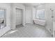 Main bathroom with double vanity, soaking tub, and walk-in shower at 3307 Kilmer Pl, Plant City, FL 33566