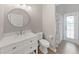 Updated bathroom with vanity, toilet, and shower at 3307 Kilmer Pl, Plant City, FL 33566