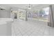 Kitchen with view to backyard through large window at 3307 Kilmer Pl, Plant City, FL 33566