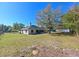 House with backyard, large tree, and shed at 3522 E 26Th Ave, Tampa, FL 33605
